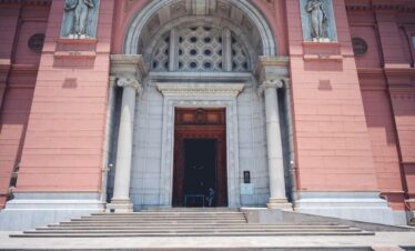 Facade of National Museum of Egyptian Civilization with grand entrance and columns