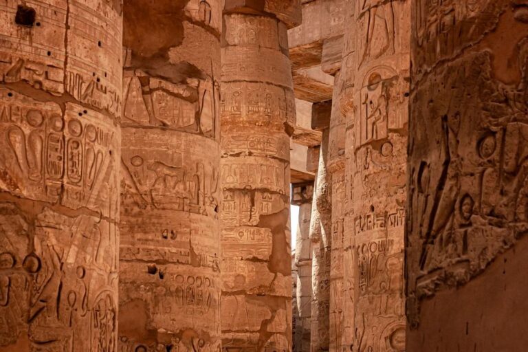Close-up of ancient columns with detailed hieroglyphics