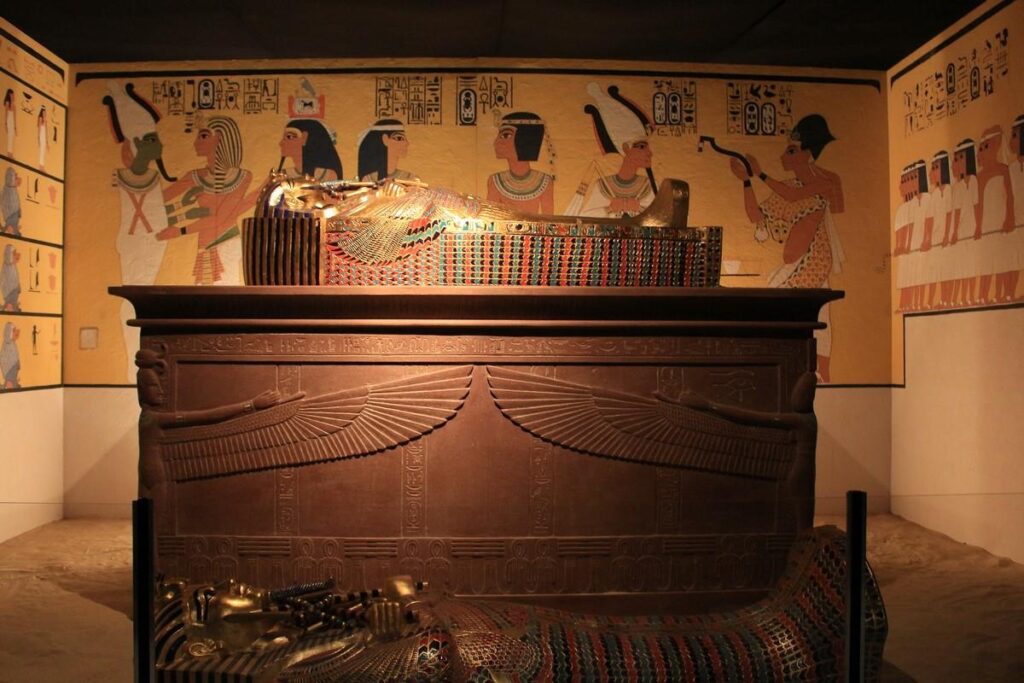 Sarcophagus adorned with colorful patterns and hieroglyphs