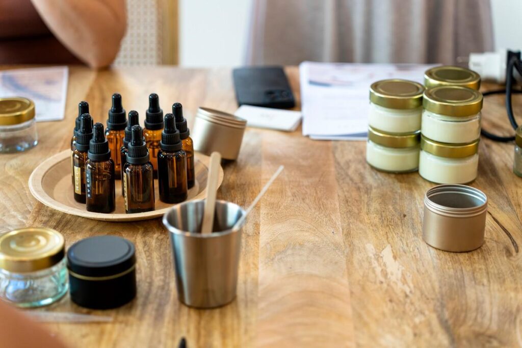 Amber glass bottles and jars on a wooden table